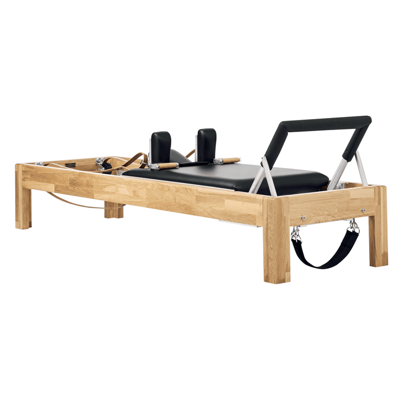 Reformer Pilates en bois ou en aluminium : lequel choisir vraiment ?